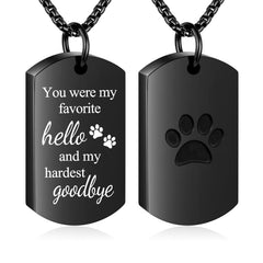 Pendentif ABOOXIU urne patte noir, porté près du cœur et mémoire personnelle.