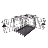 Amazon Basics boîte chien métal pliable, transport facilité et cadre robuste.