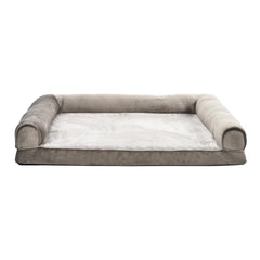 Forme en U avec coussins latéraux pour soutenir le cou et la tête.