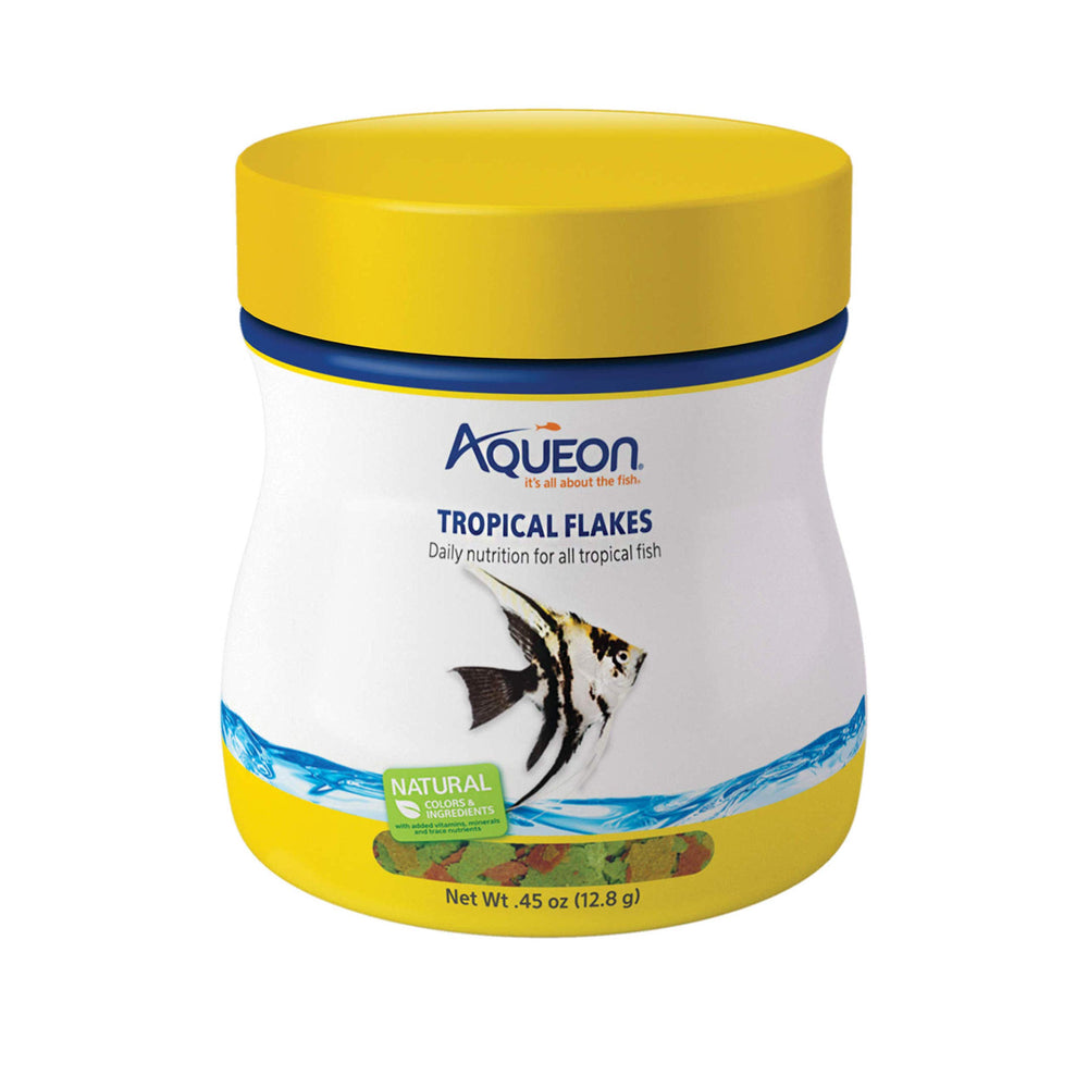 Boîte Aqueon Tropical Flakes montrant l’alimentation en surface pour les poissons.