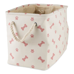 Panier Bone Dry taille petite avec motif patte et os rose, idéal pour ranger friandises et jouets.