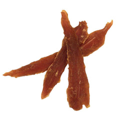 Cadet chien heureux avec friandise poitrine de canard.