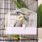 Colorday bain pour oiseaux dans cage avec parois transparentes réduisant les éclaboussures.