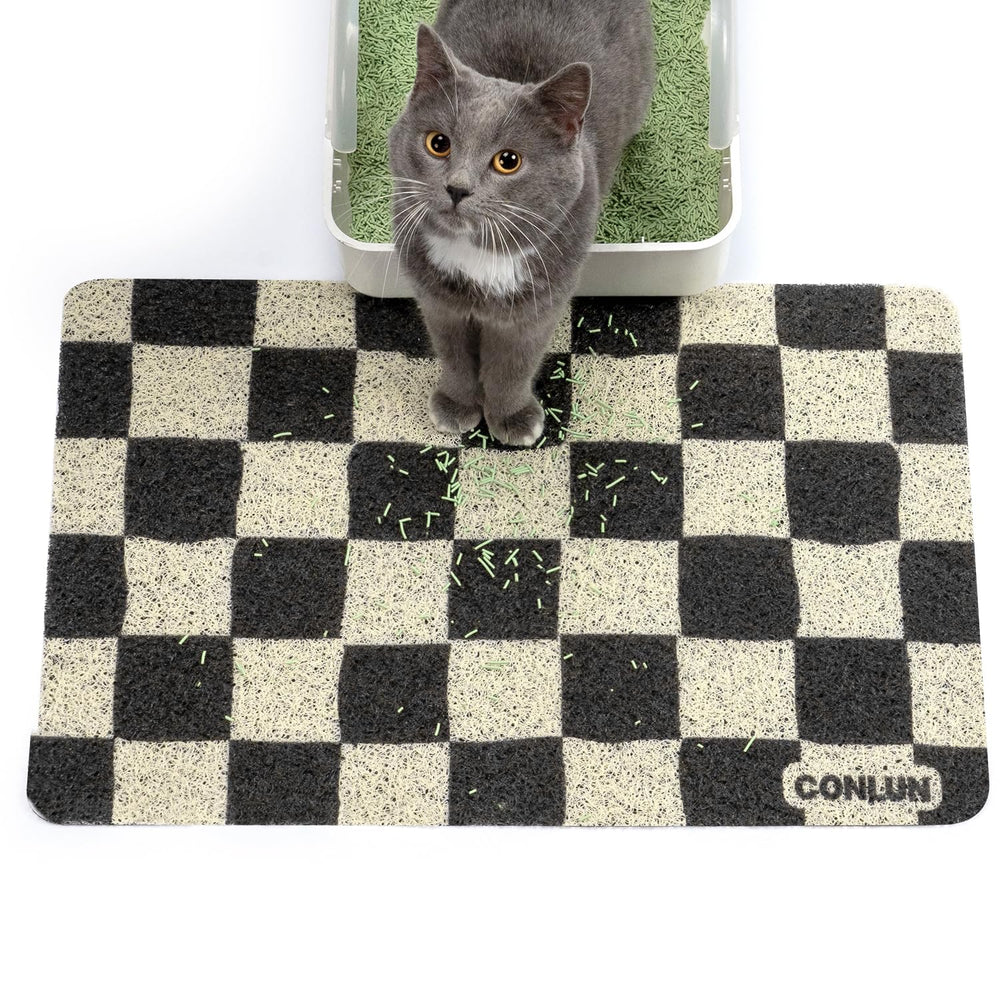 Tapis Conlun litiere damier capture les grains et protège le sol.