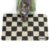 Tapis Conlun litiere damier capture les grains et protège le sol.