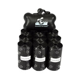 Distributeur Downtown Pet Supply avec sacs-poubelle pour chien lors d’une promenade.
