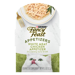 Fancy Feast Apéritifs montre des morceaux poulet blanc dans bouillon de thon, parfait comme complément.