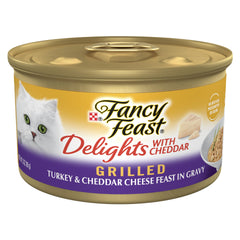 Fancy Feast Delights dinde grille cheddar avec jus, idéal pour stimuler l'appétit félin.