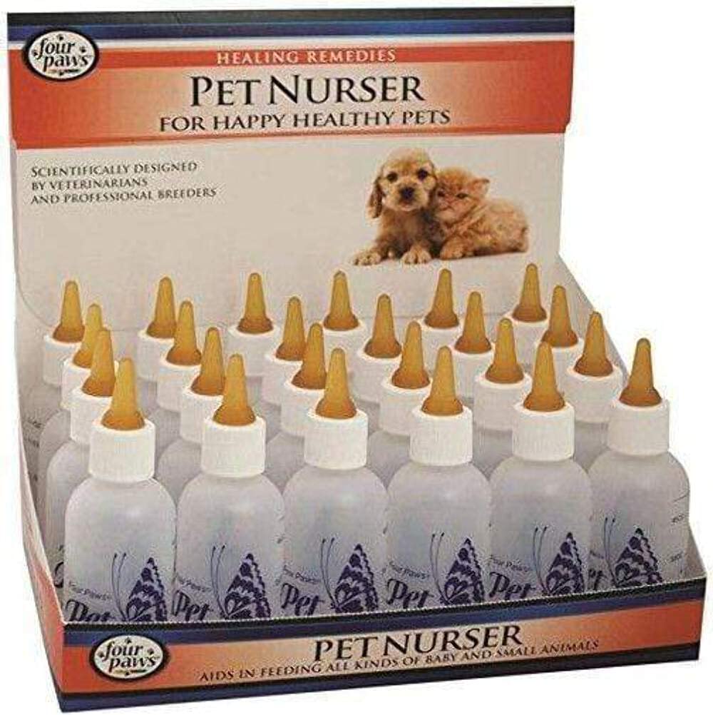 Biberons Nurser Four Paws de 2 oz, sur boîte compteur, idéal pour nourrir les animaux à domicile.