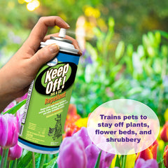 Utilisation extérieure de Keep Off Four Paws protégeant les zones vertes.