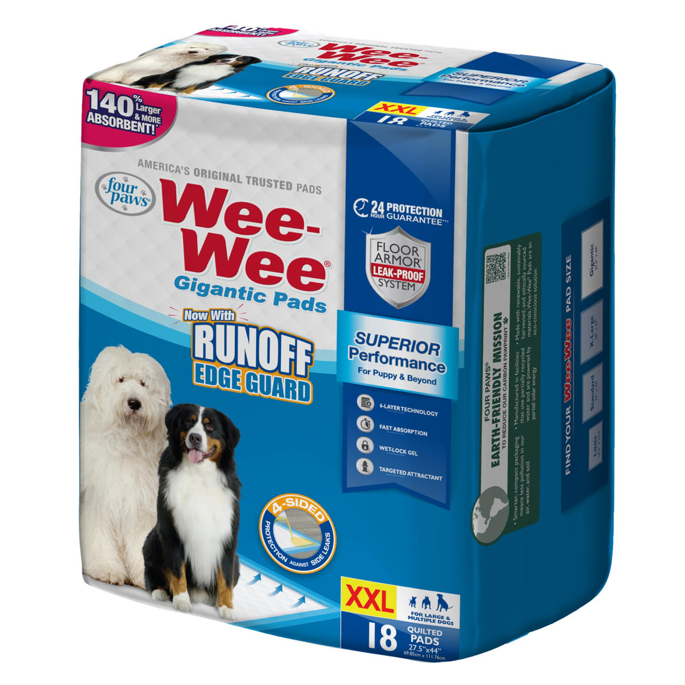 Four Paws Wee-Wee Pad barrière anti-fuite sur quatre côtés protège le sol.