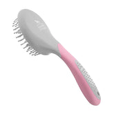 Brosse Harrison Howard pour crinière rose, démêlage en douceur.