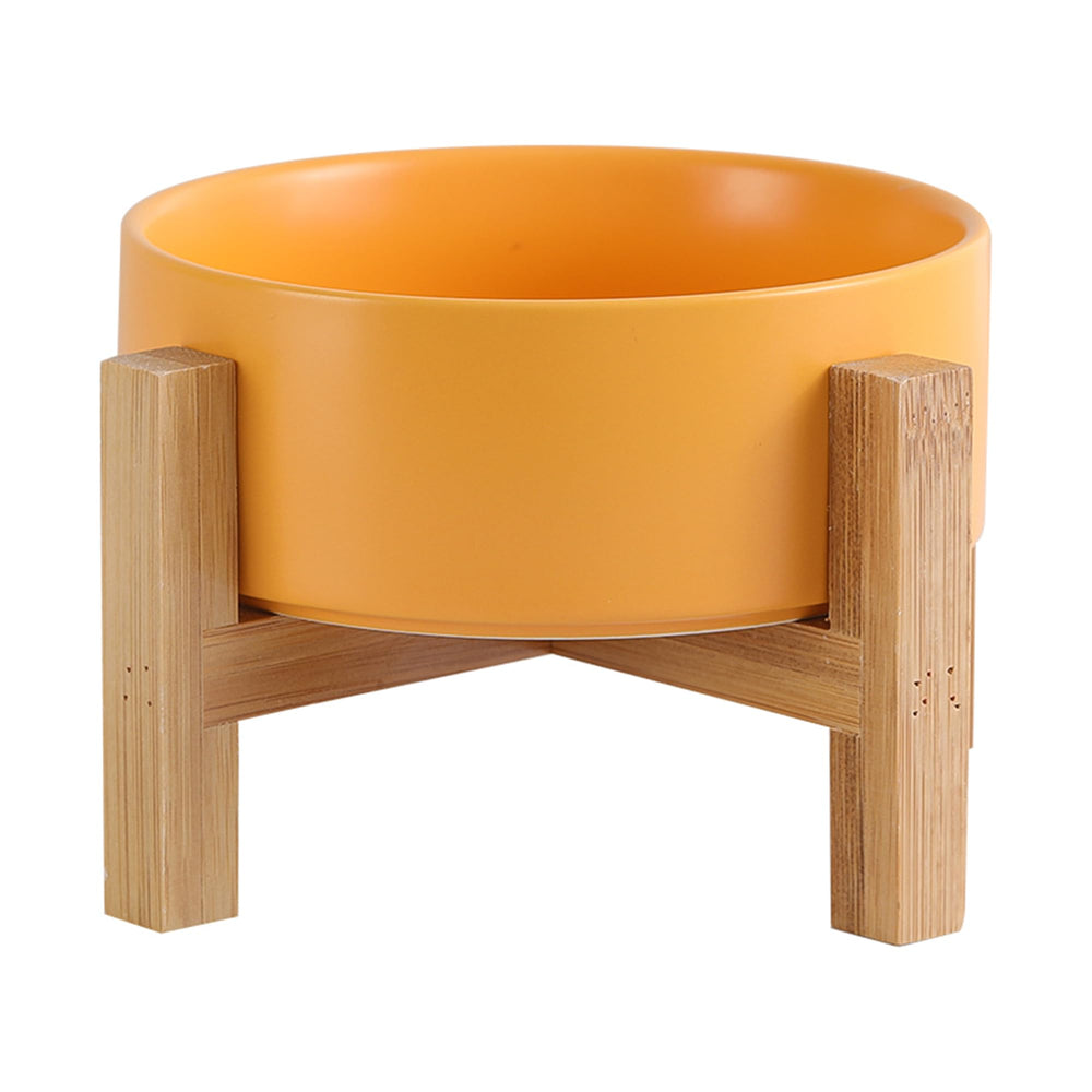Bol chat elevé en céramique et bambou jaune, pratique pour les repas.