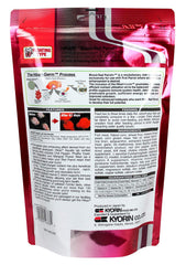 Granulés moyens de Hikari Blood Red Parrot+ en gros plan, texture uniforme