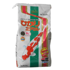 Hikari Excel, bouteille-versement, contrôle précis des portions pour poissons et meilleure gestion de l'alimentation.