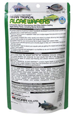 Détail de wafer algues Hikari, texture attrayante pour poissons herbivores.