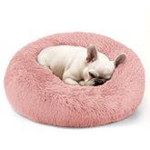 Hoewina lit rond petit chien rose pour un repos sûr et confortable.
