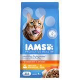 IAMS poulet et saumon croquettes dans bol, repas équilibré pour chat.