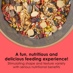 Le mélange révèle grains, fruits et légumes pour calopsitte gourmand.
