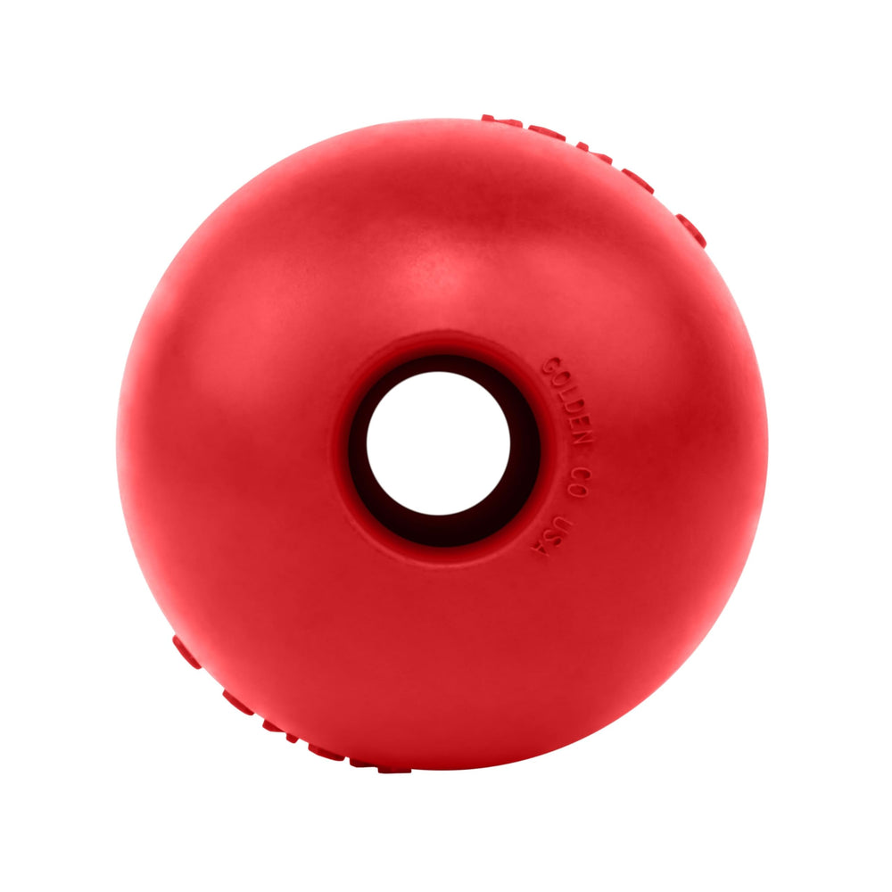 Balle Kong rouge avec trou, parfaite pour le fetch et la stimulation mentale.
