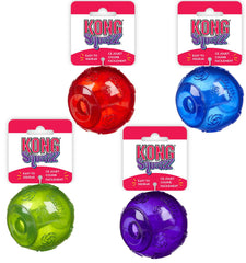 Balle Kong Squeezz pour chien avec sifflet interne, robuste et idéale pour jeux interactifs.
