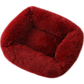 Lit donut La La Pet rouge offrant un cocon douillet pour chats et petits chiens.