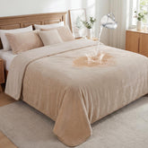 Couverture LOOBANI imperméable sur lit 60x80, protection contre les liquides.