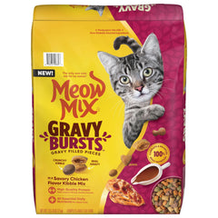 Meow Mix Gravy Bursts, sac 13,5 livres montrant des croquettes avec gravy délicieux.