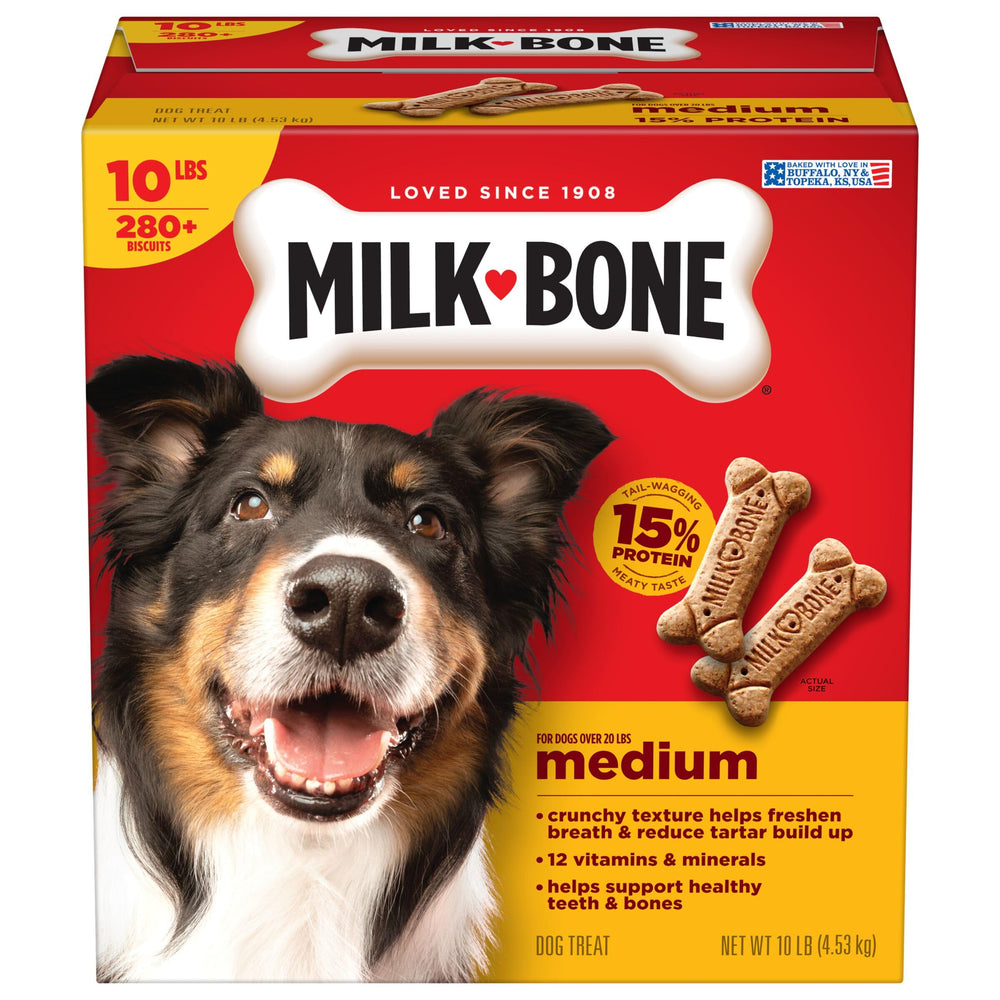 Gâterie Milk-Bone Original en forme d'os pour chien moyen dans une boîte.