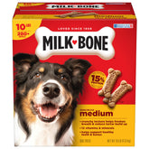 Gâterie Milk-Bone Original en forme d'os pour chien moyen dans une boîte.