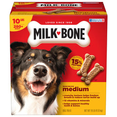 Gâterie Milk-Bone Original en forme d'os pour chien moyen dans une boîte.