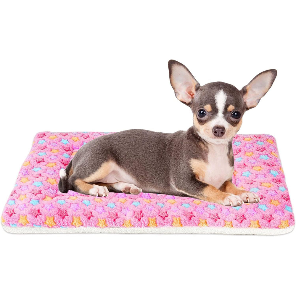 Coussin Mora Pets pour chien rose à étoiles, idéal dans caisse et voyage.