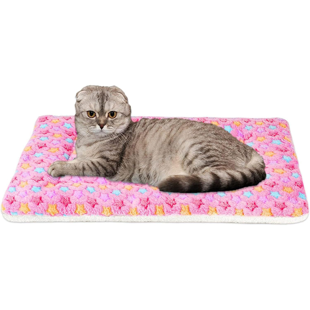 Tapis Mora Pets réversible en rose à étoiles, idéal pour caisse et panier