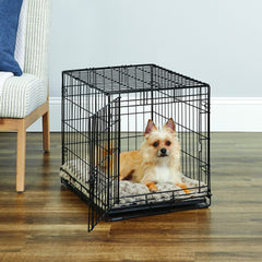 New World cage, verrou coulissant et bloc-pattes pour plus de sécurité en voyage.