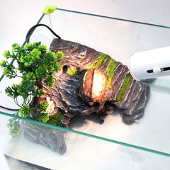 Décor rochers réalistes OMEM imitant un paysage naturel dans le terrarium.