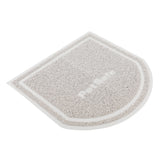 Tapis PetSafe sur le sol capturant les grains et protégeant le sol.