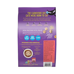 Morceaux de poulet dans les croquettes Tiki Cat Born Carnivore, protéines hautes.