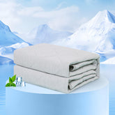 Rywell Couverture Refroidissante grand format sur canapé pour une détente fraîche.