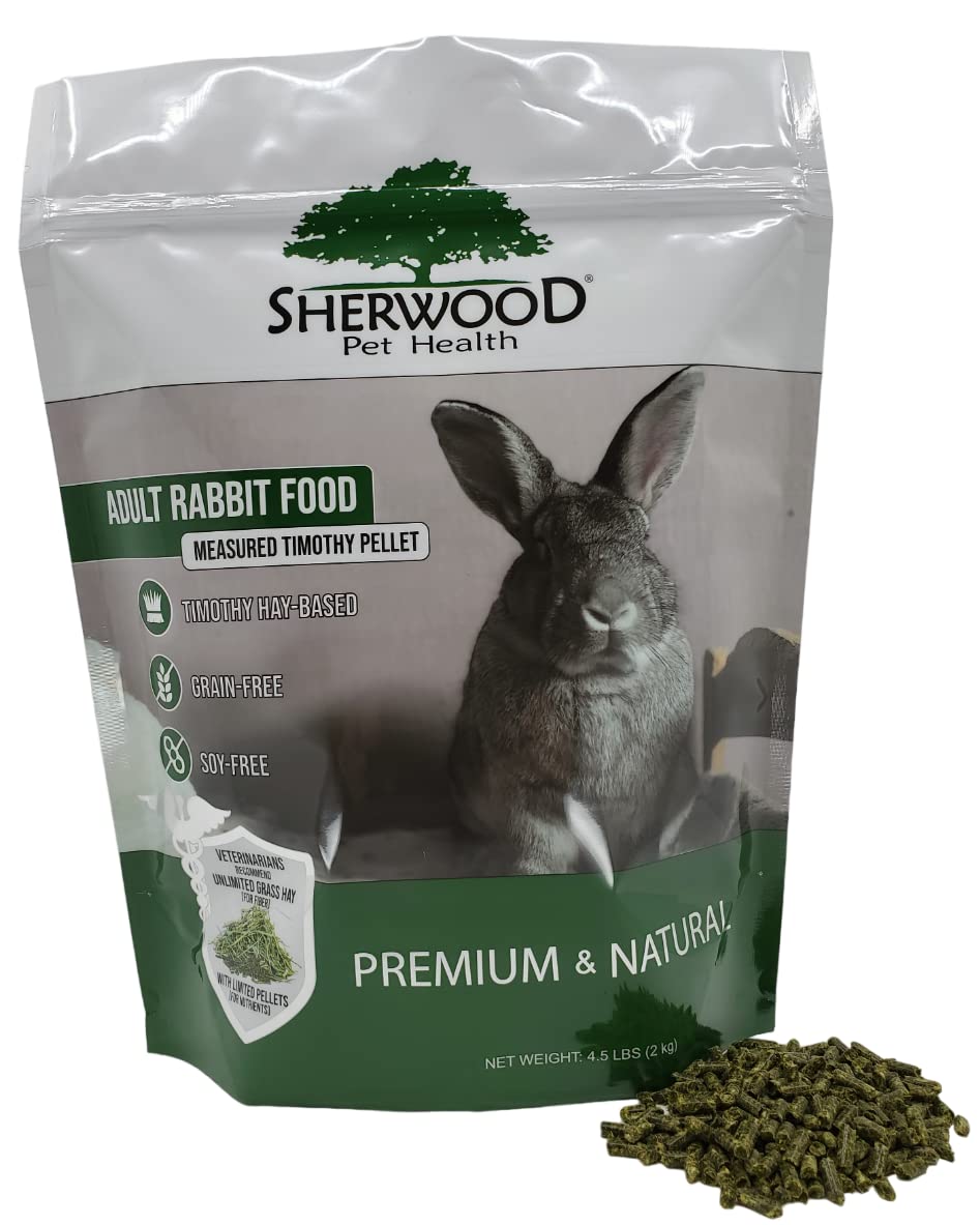 Sherwood Pet Health : lapin mange granulés au foin Timothy dans son bol, repas naturel.