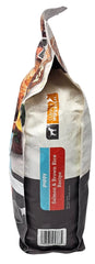 SIMPLY NOURISH croquettes chiot saumon riz brun, faciles a servir.