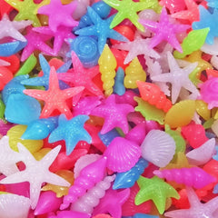 Galet d'aquarium SpringSmart en forme de conque, couleurs vives pour un décor vivant.