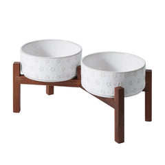Bol SPUNKYJUNKY en céramique sur socle acacia, design élégant pour petits chiens.