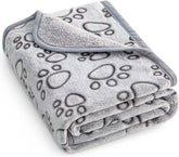 Couverture Stuffed avec empreintes sur le dessus, idéal pour des câlins doux.
