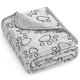 Stuffed: couverture pour petit chien, douceur idéale sur le canapé.