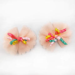 Boucles en chiffon faciles à ranger dans l'étui inclus.