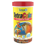 Flocons tropicaux de la marque Tetra dans un bocal nourrissant des poissons colorés.