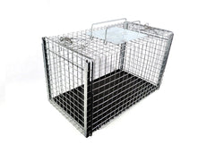 Tomahawk Live Trap 306NC2 avec deux portes glissantes pour transfert sûr.