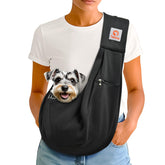 Tomkas sling ouverture grande pour faciliter l’installation du petit chien