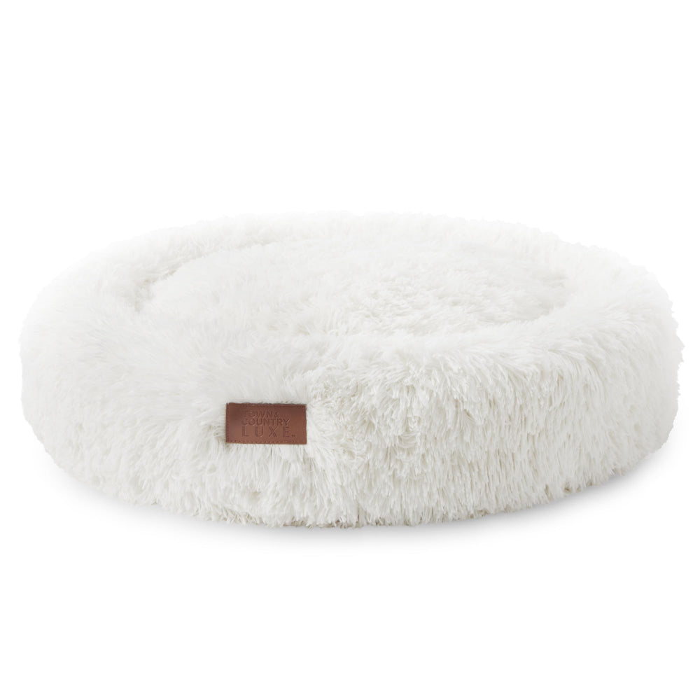 Lit donut crème Town & Country Luxe CuddleTown ensemble, repos doux et sécurisant.