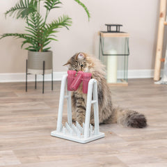 TRIXIE Turn Around stimule l’instinct de chasse tout en récompensant avec des friandises.